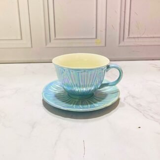 MUG CON PALTO FLOR TORNASOLADO
